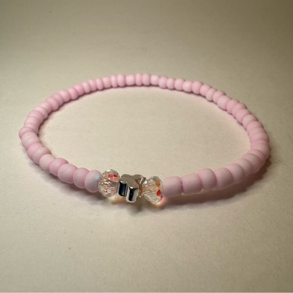 Hand Crafted Pink Beaded Bracelet with Sterling Silver butterfly